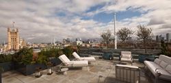 Rooftop patio area with view of London