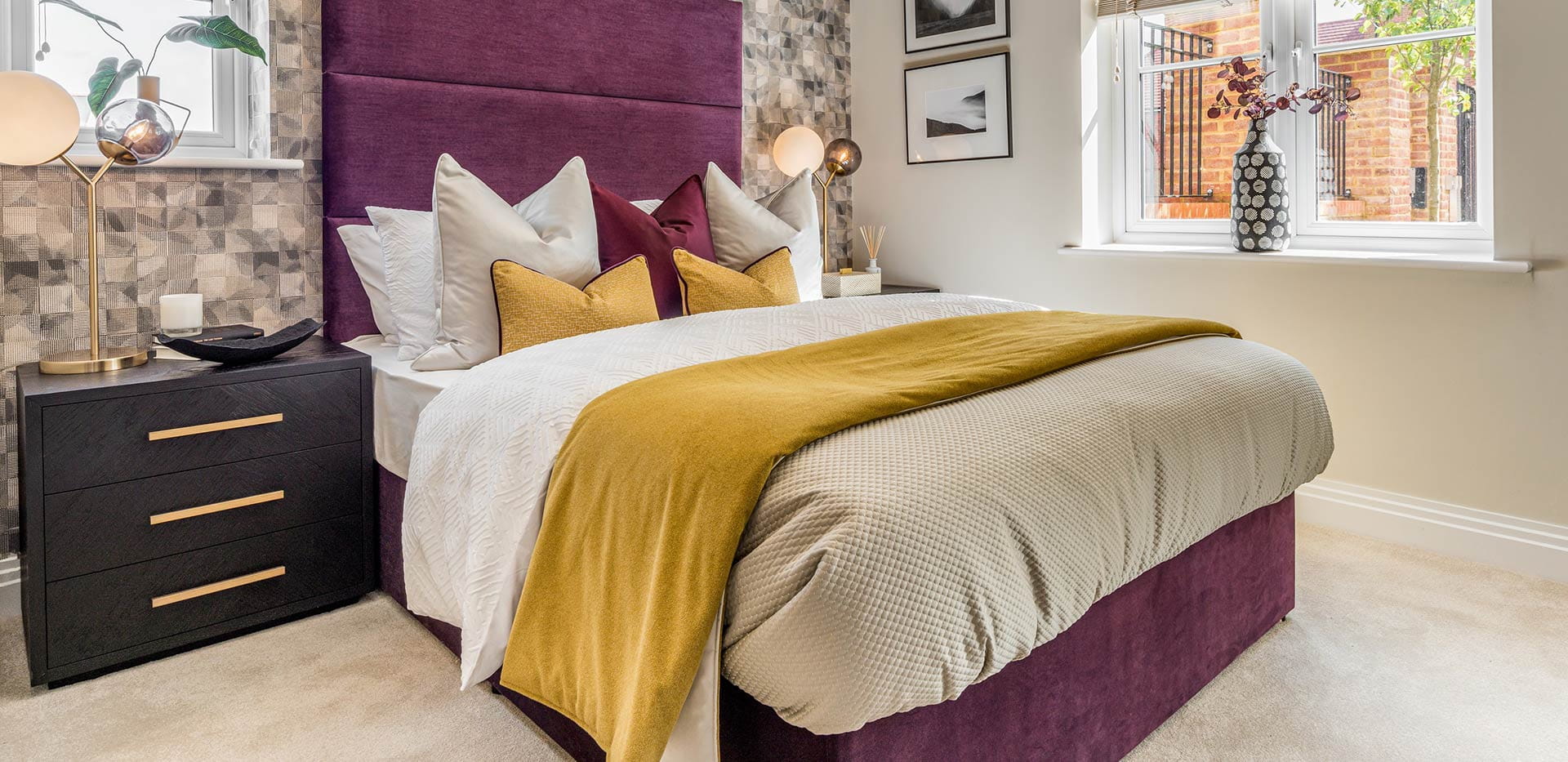 An interior Burgundy Bedroom image at Show Apartment 187 at Abbey Barn Park