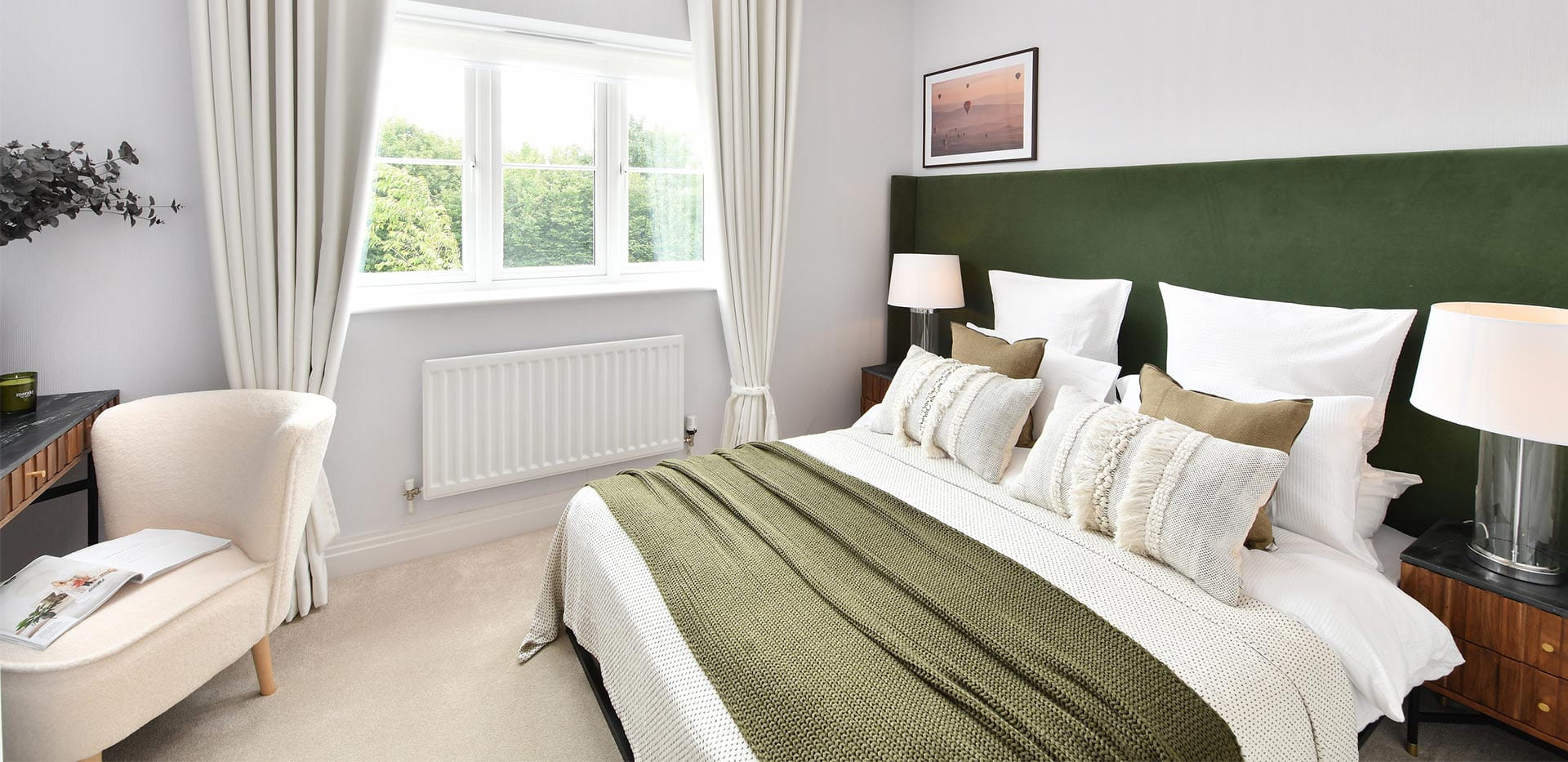 An interior Bedroom image with a green headboard at Abbey Barn Park