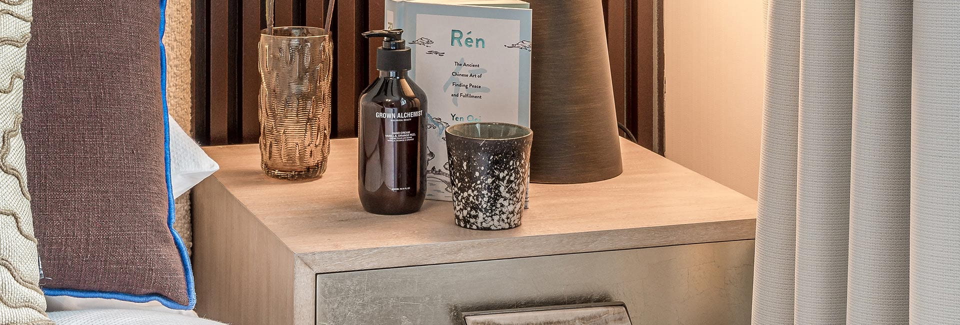 An interior image of a bedside table at Abbey Barn Park
