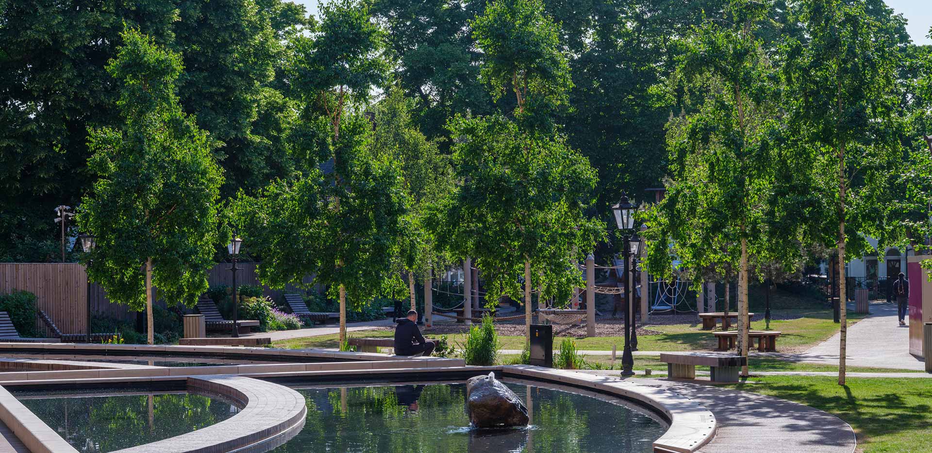An exterior image of Alexandra Gate with a beautiful water feature