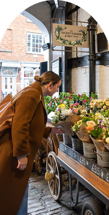 An image of a woman shopping in Guildford Town