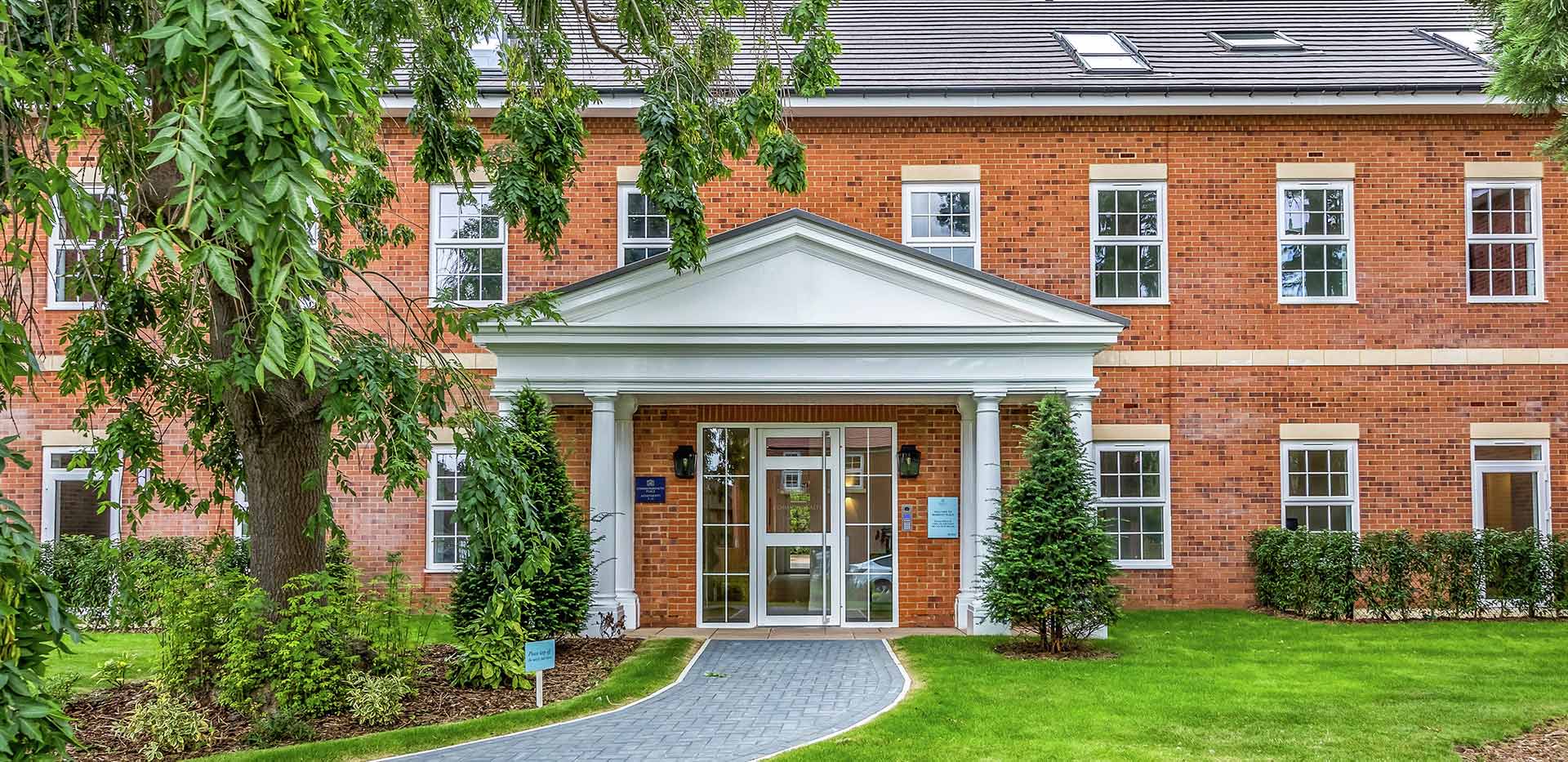 Exterior image of Berkeley Place on a Summer's day