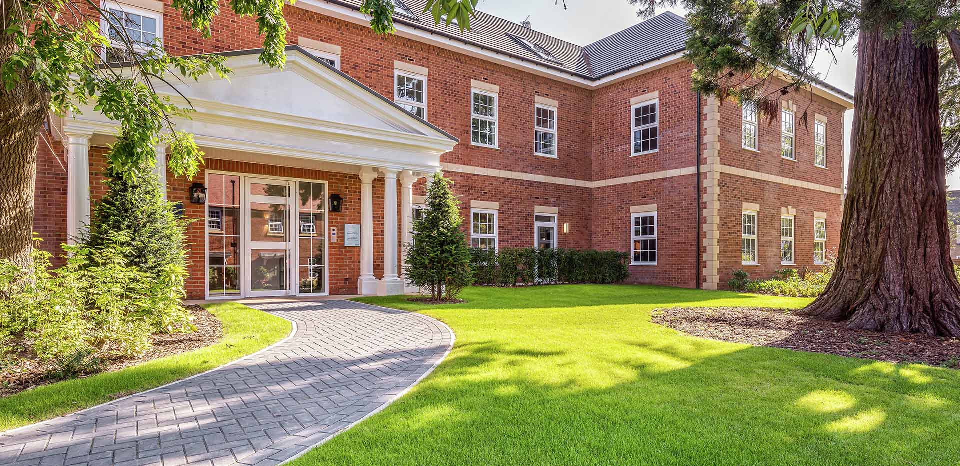 Exterior image of Berkeley Place on a Summer's day
