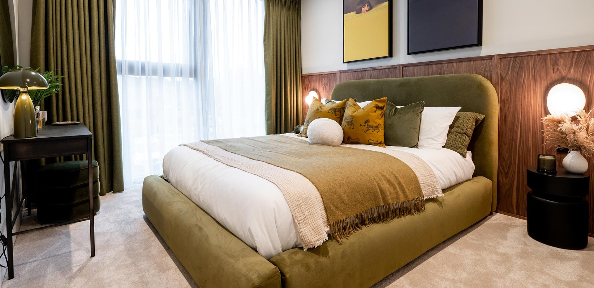 Bermondsey Place Art House showhome bedroom with a dark colour palette