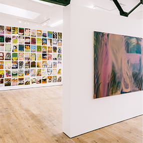 Art gallery interior with wall hangings on display