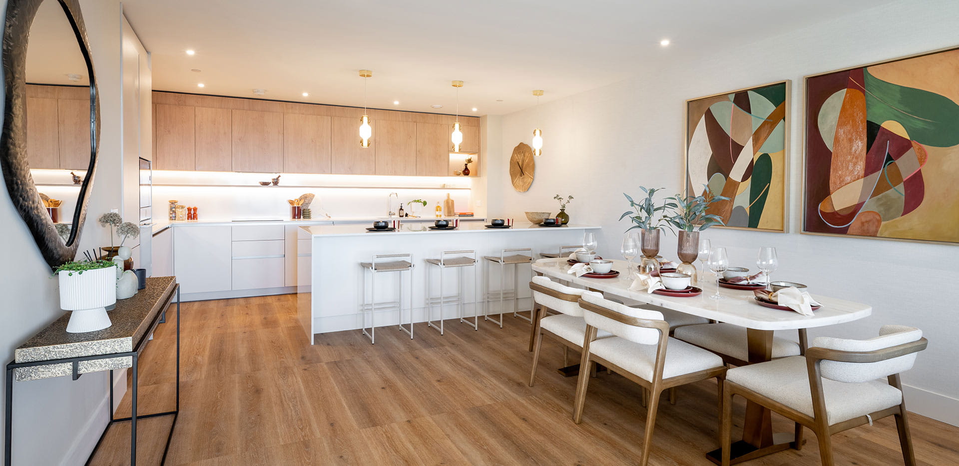 An image of the kitchen-dining area within a 3-bedroom penthouse at Bow Green