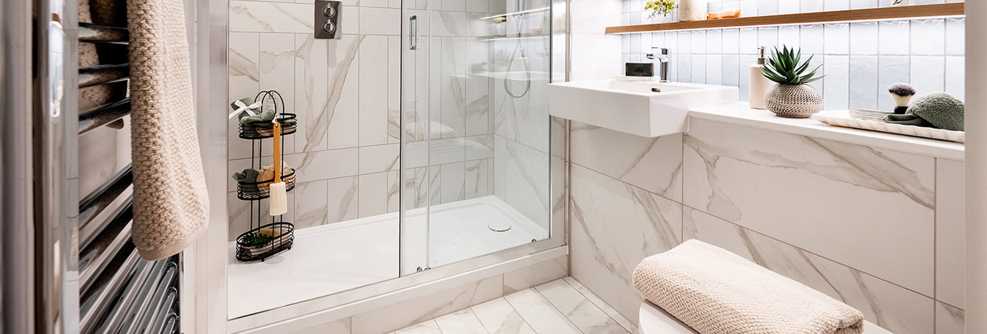 Bow Green, 2 bedroom homes, bathroom with a light, marbled design