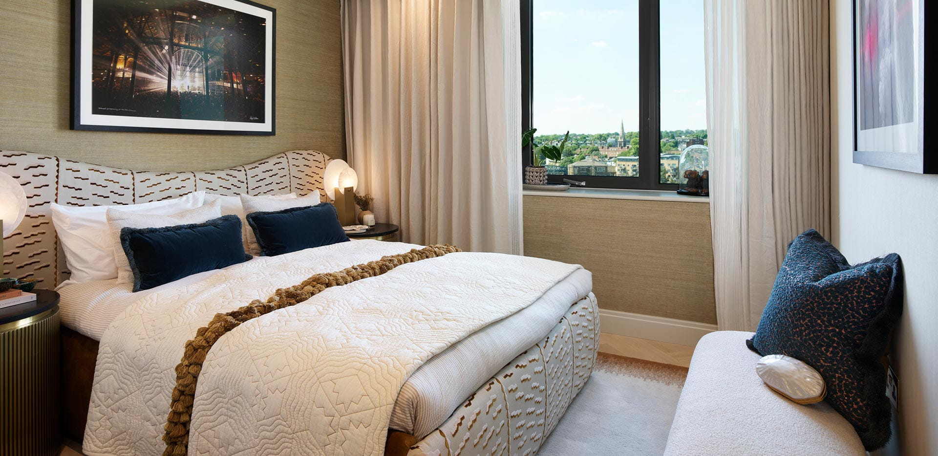 Spacious bedroom with city views