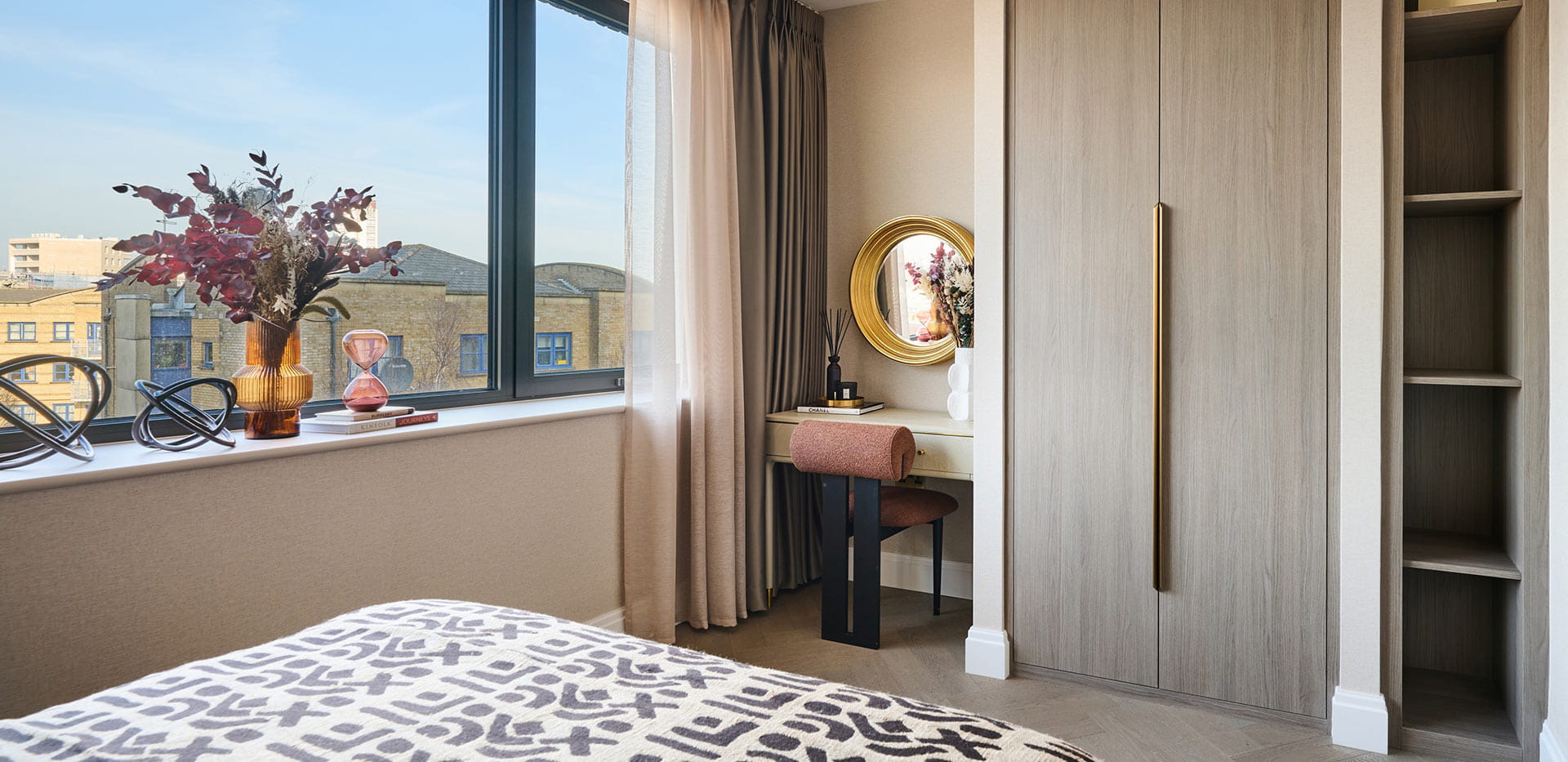 An image of a bedroom dressing area with stunning views over Camden