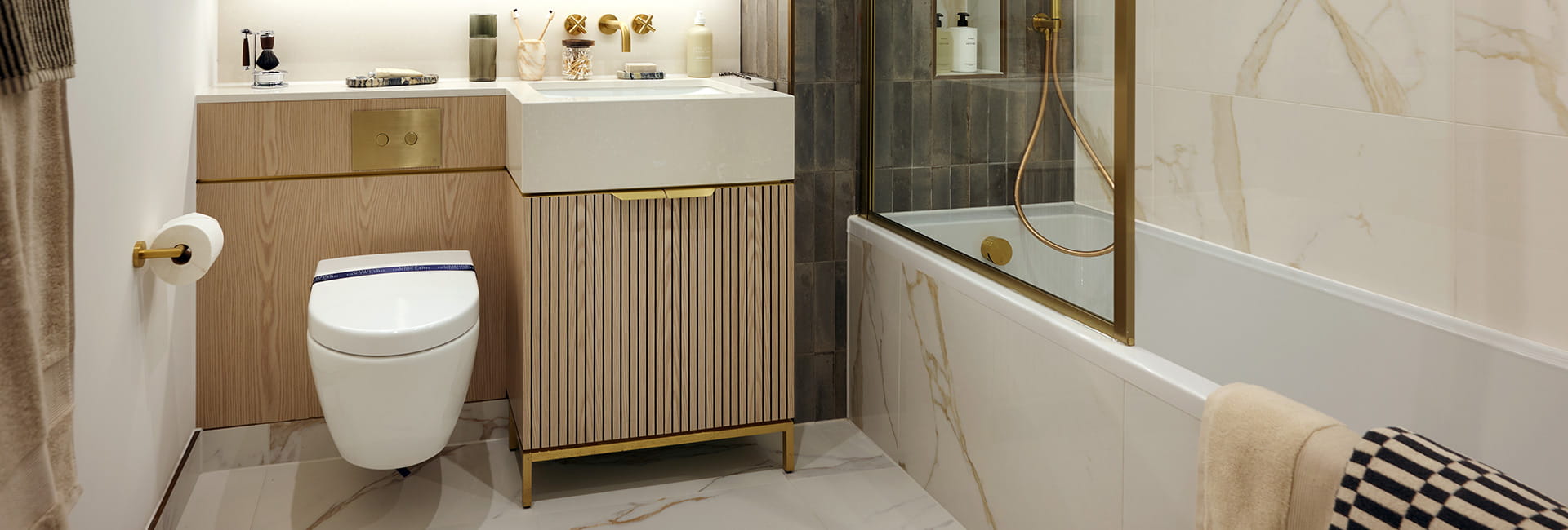 Camden Goods Yard, property 66, spacious bathroom with a light, marbled design
