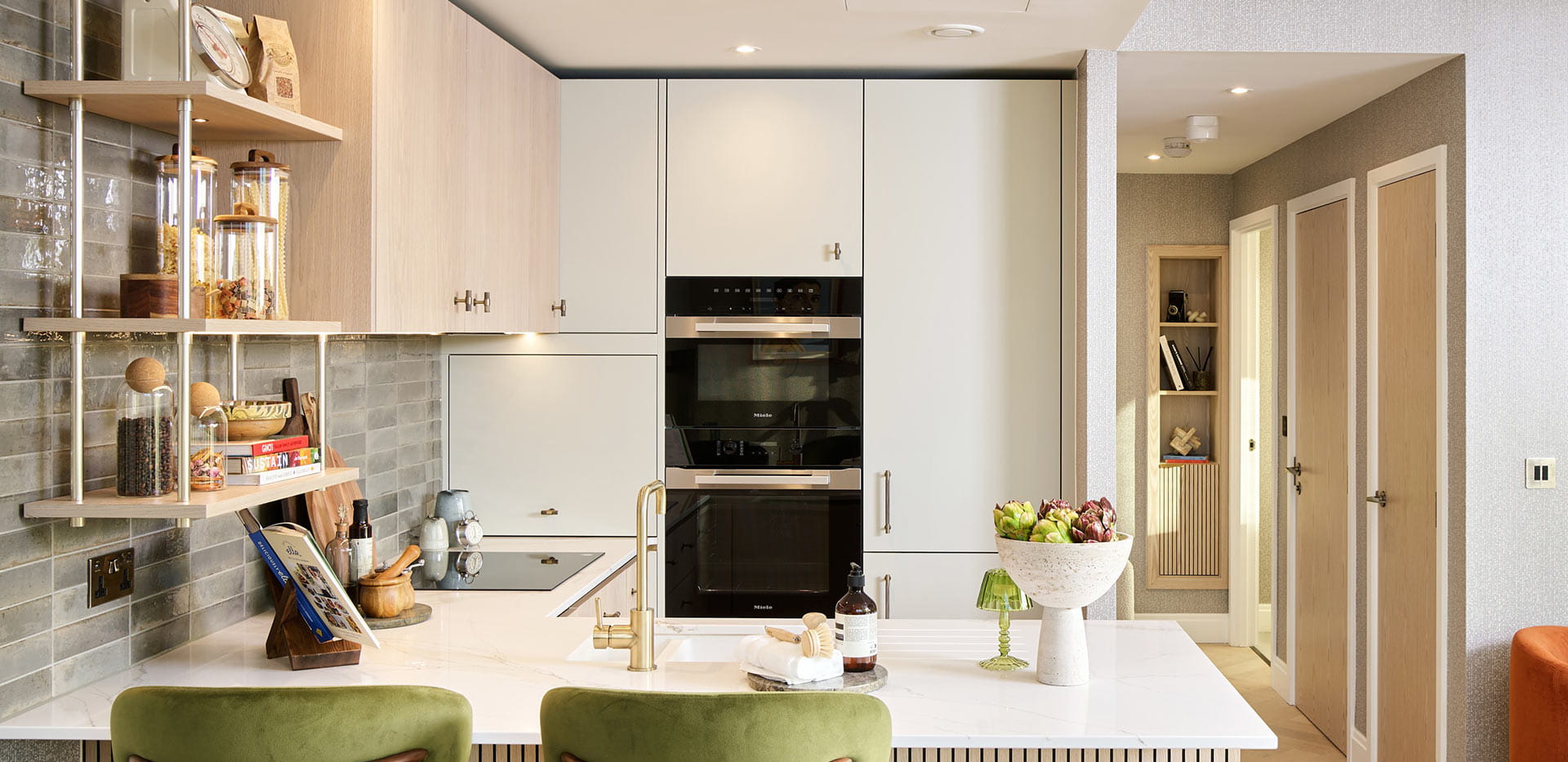 An image of the kitchen from a One Bedroom Showhome at The Regent