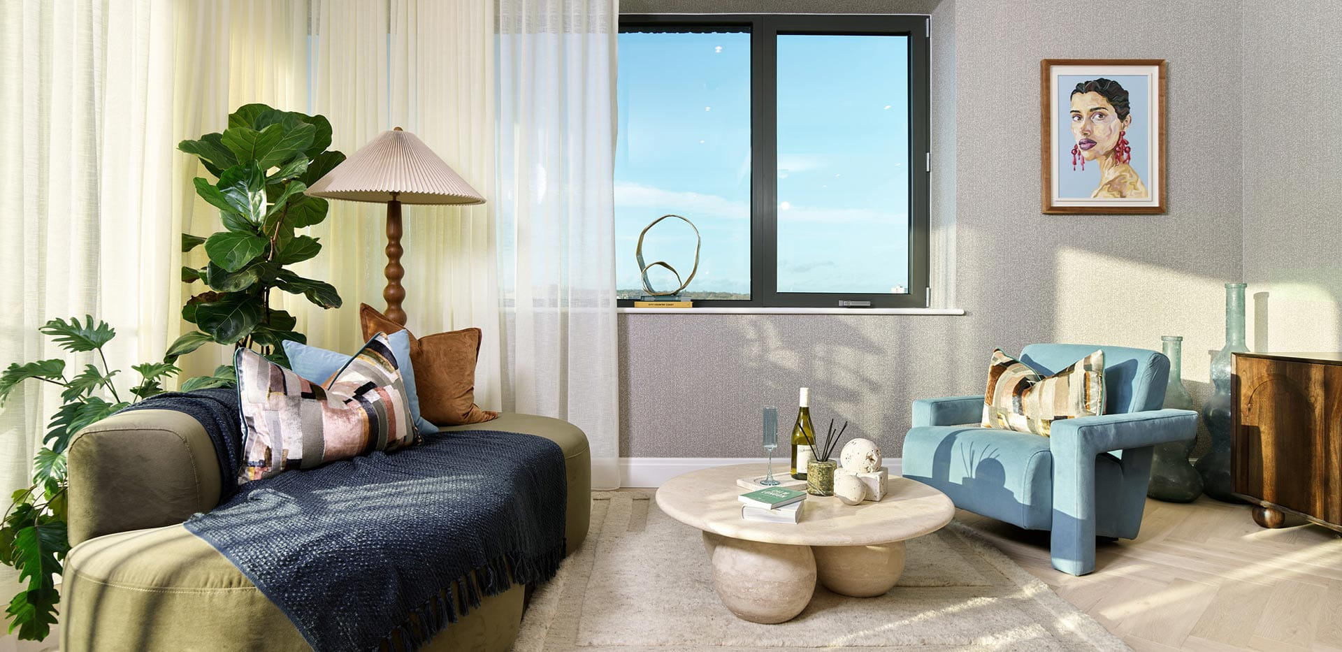 An image of the living area from a One Bedroom Showhome at The Regent