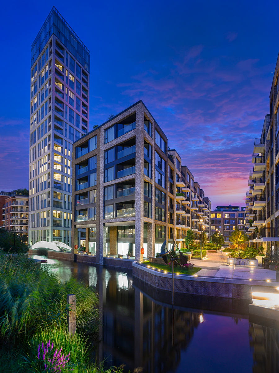 An exterior photograph Westwood House at night