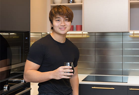 An image of Chi in the Kitchen at his new home