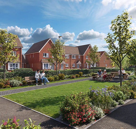 An image of homeowners sitting outside their new homes at Eastbrook Village