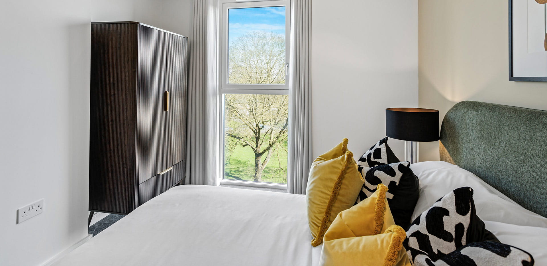 Eden Grove, three bedroom home spacious bedroom with green views