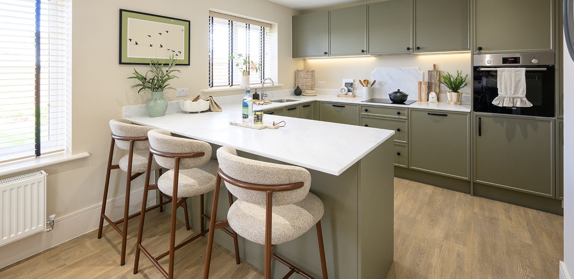 An interior photograph of the Kitchen area from the 3 Bedroom Showhome at Foal Hurst Green