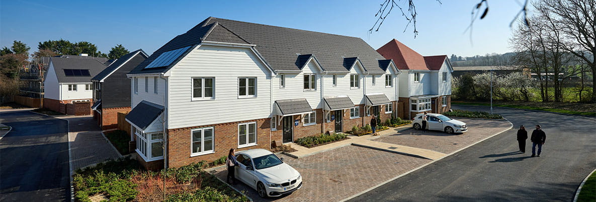 New build homes on the corner of a newly paved street