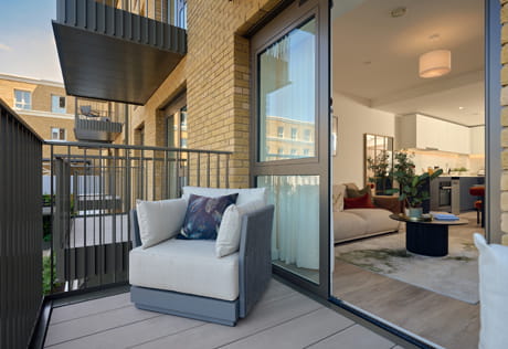 Balcony with outdoor furniture.