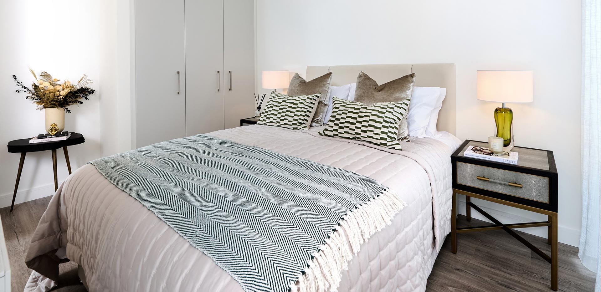 An image of the Bedroom with wardrobe and bedside tables