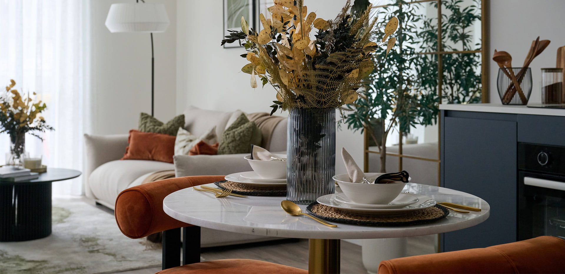 A close up of the dining table with views into the living area
