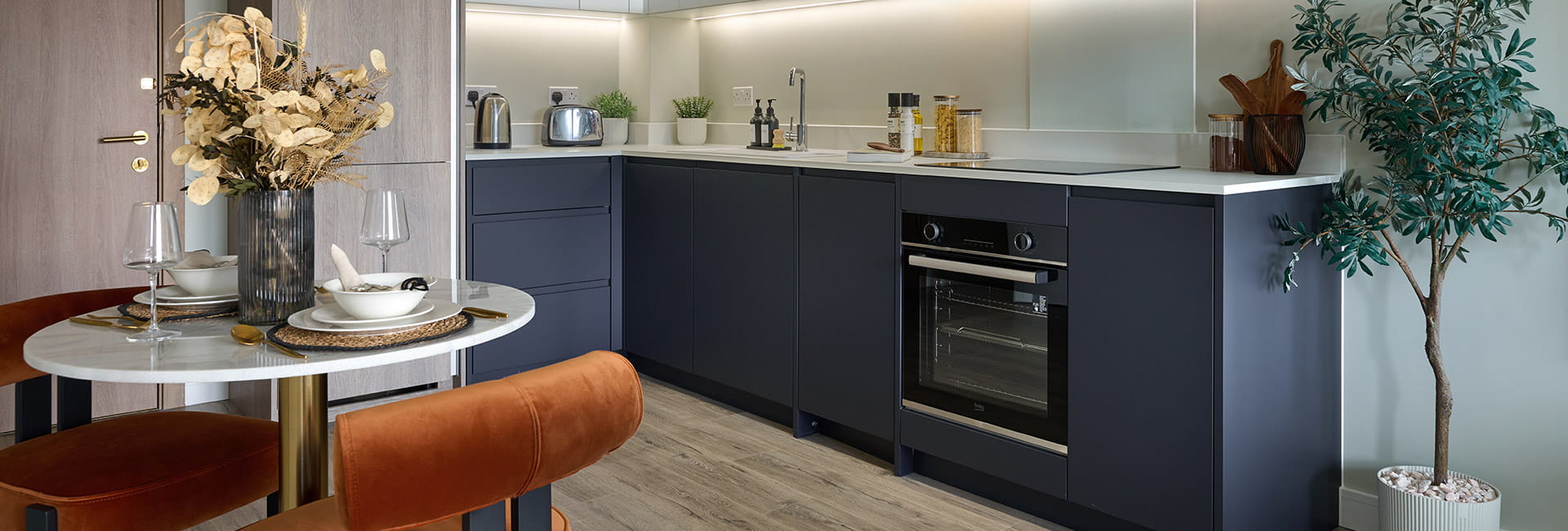 Fulham Reach, apartment, spacious kitchen with a dark blue design