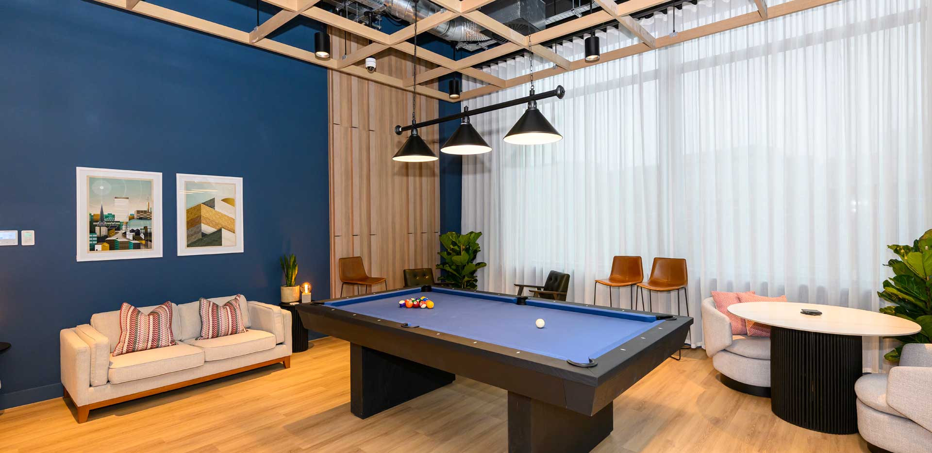 Glasswater Locks resident facilities showing blue felt pool table and lounge space