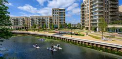 Exterior Image of residents paddle-boarding on the Grand Union canal