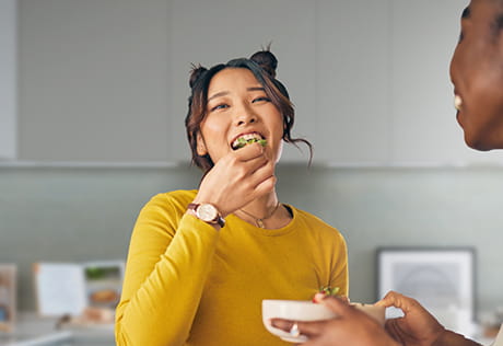 An image of a woman eating