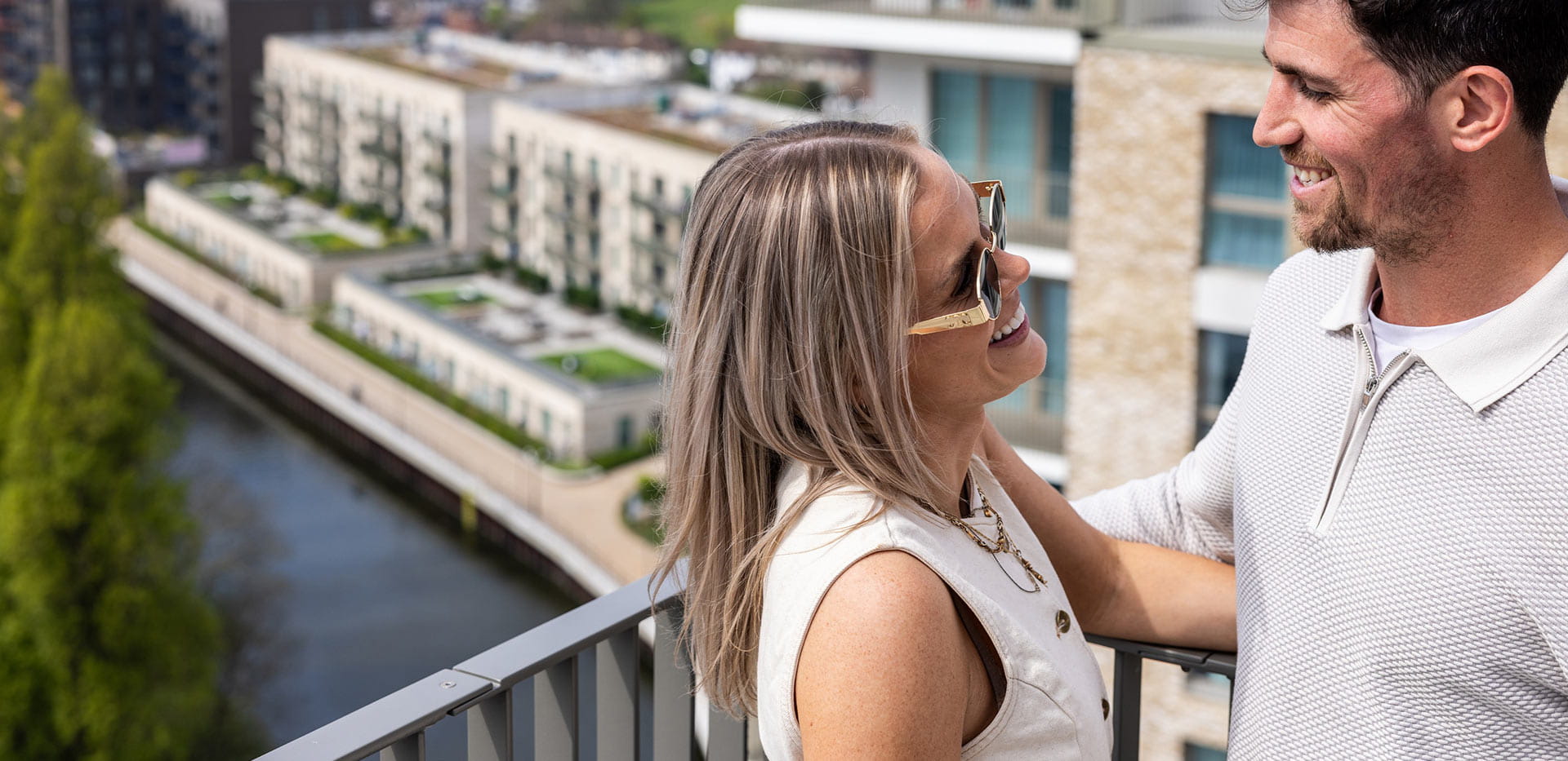 Couple on a balcony overlooking Grand Union
