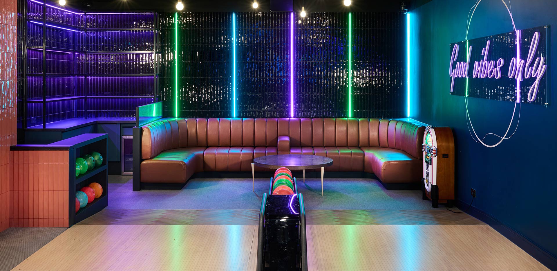 An image of the seating area for the bowling alley at Grand Union