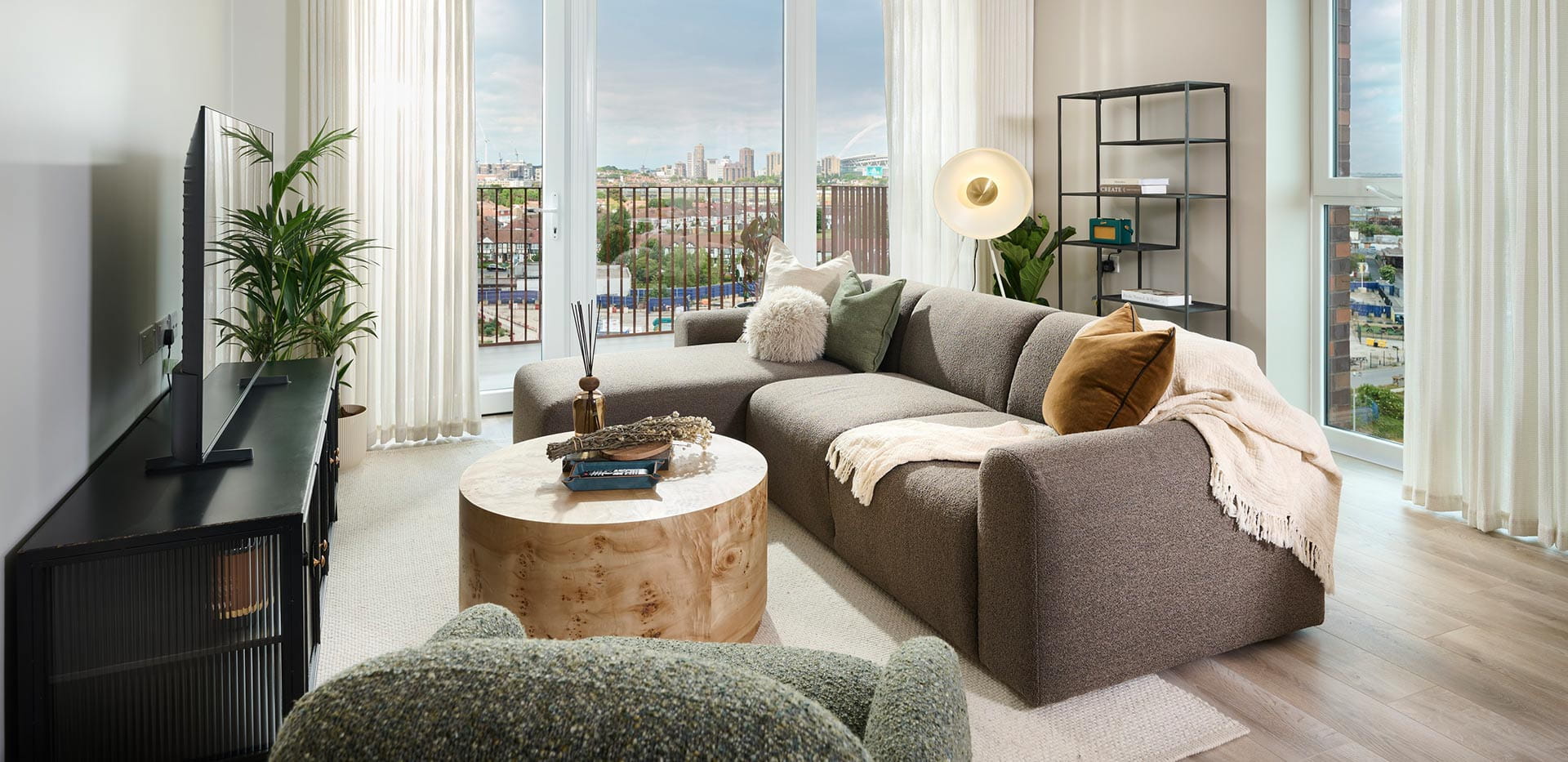 The Iris, spacious living area with city views