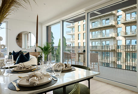 An interior dining room image within a showhome at Waterview House, Grand Union