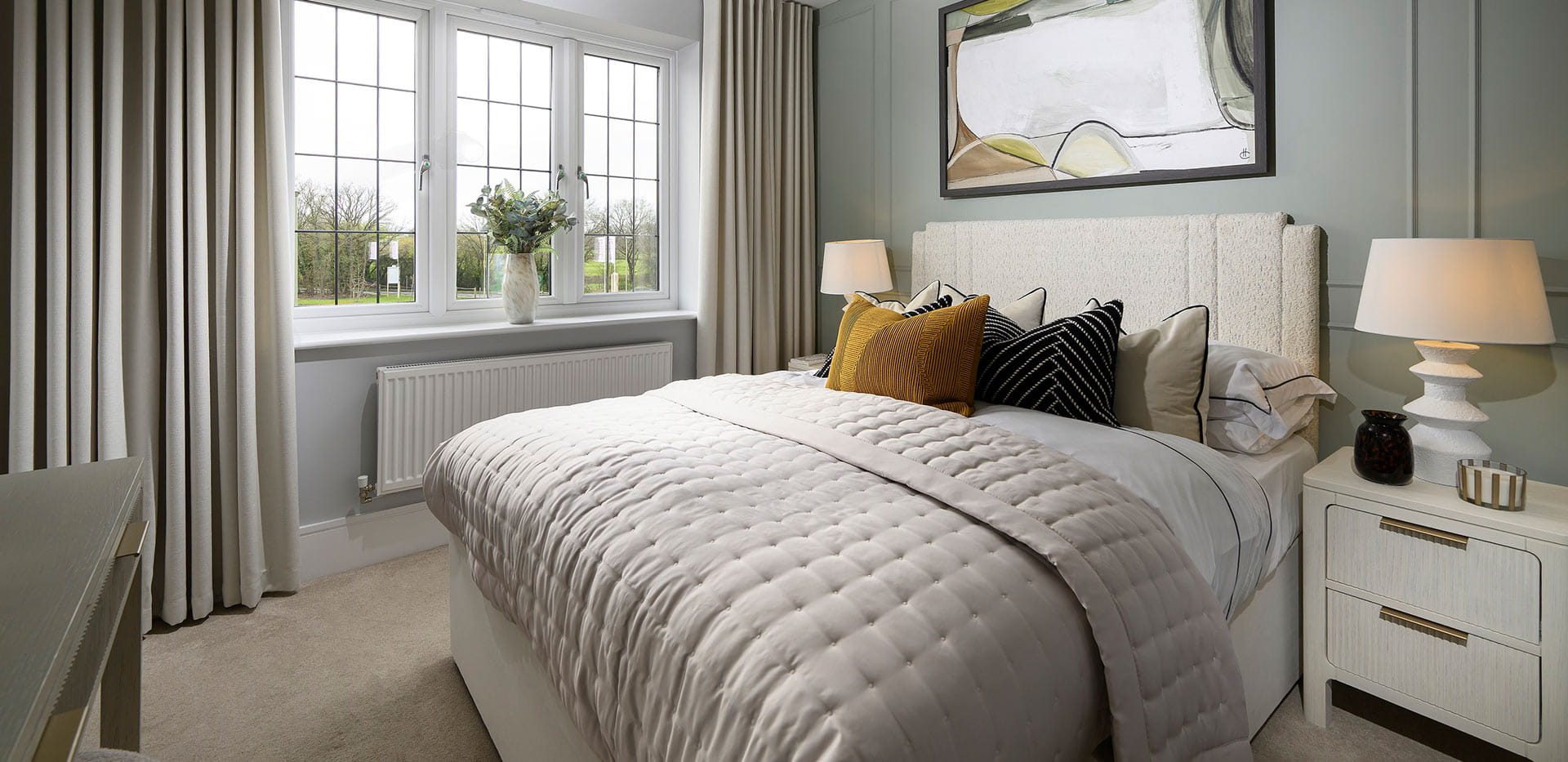 An interior Bedroom image with the light from outside shining in