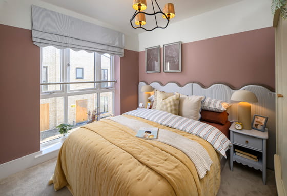 Double bed, large window, wardrobe and carpet flooring