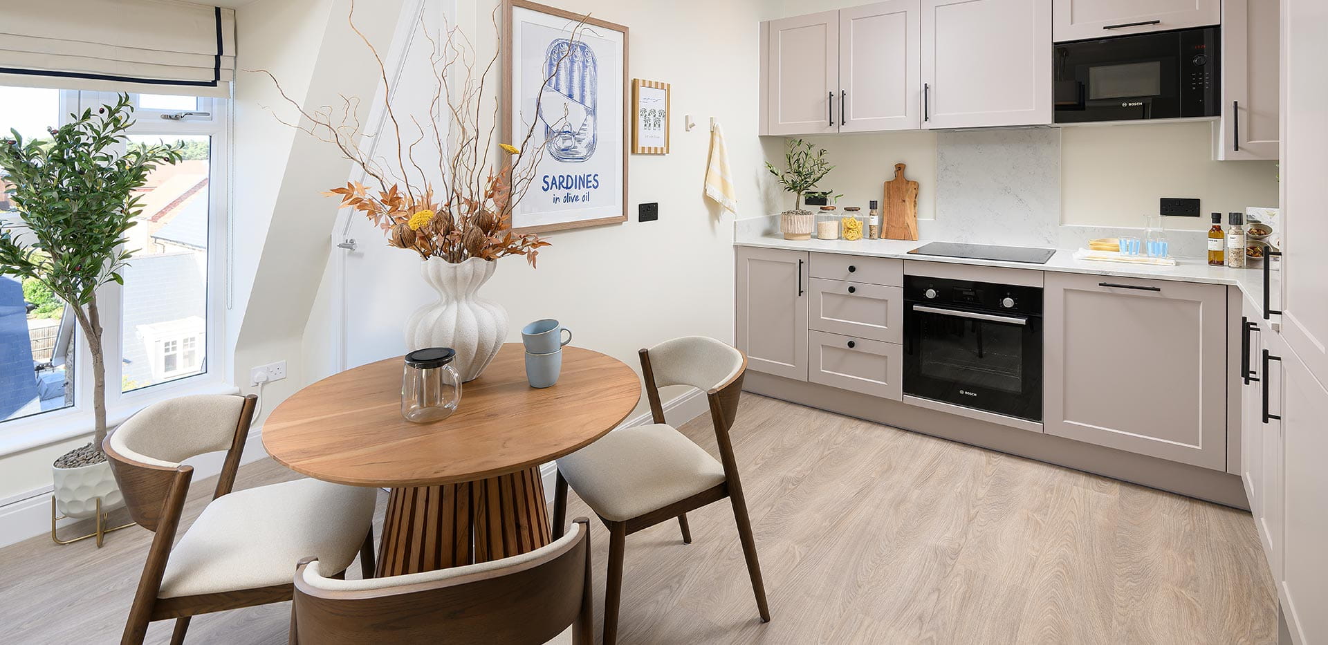 An interior image of a Kitchen / Dining Area from the 1 Bedroom Showhome