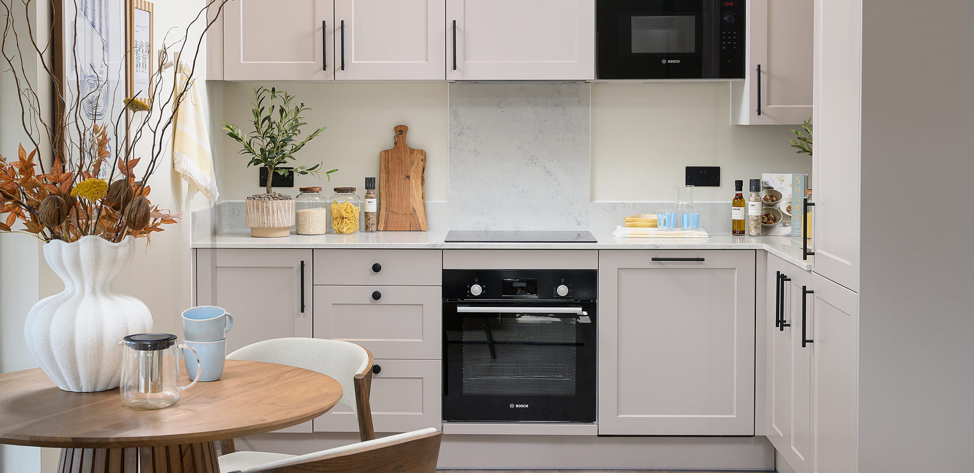 An interior image of a Kitchen / Dining Area from the 1 Bedroom Showhome