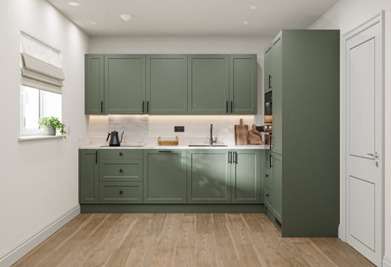 Kitchen, dark green cupboard panels and white countertops, modern appliances.