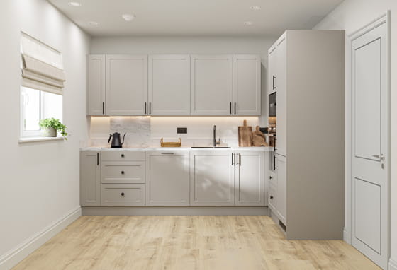 Kitchen, grey cupboard panels and white countertops, modern appliances.