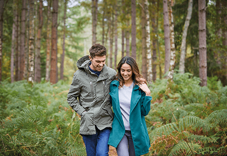 An Image of a Couple in a Forest