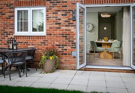 An image of the garden/patio at a house at Hartland Village
