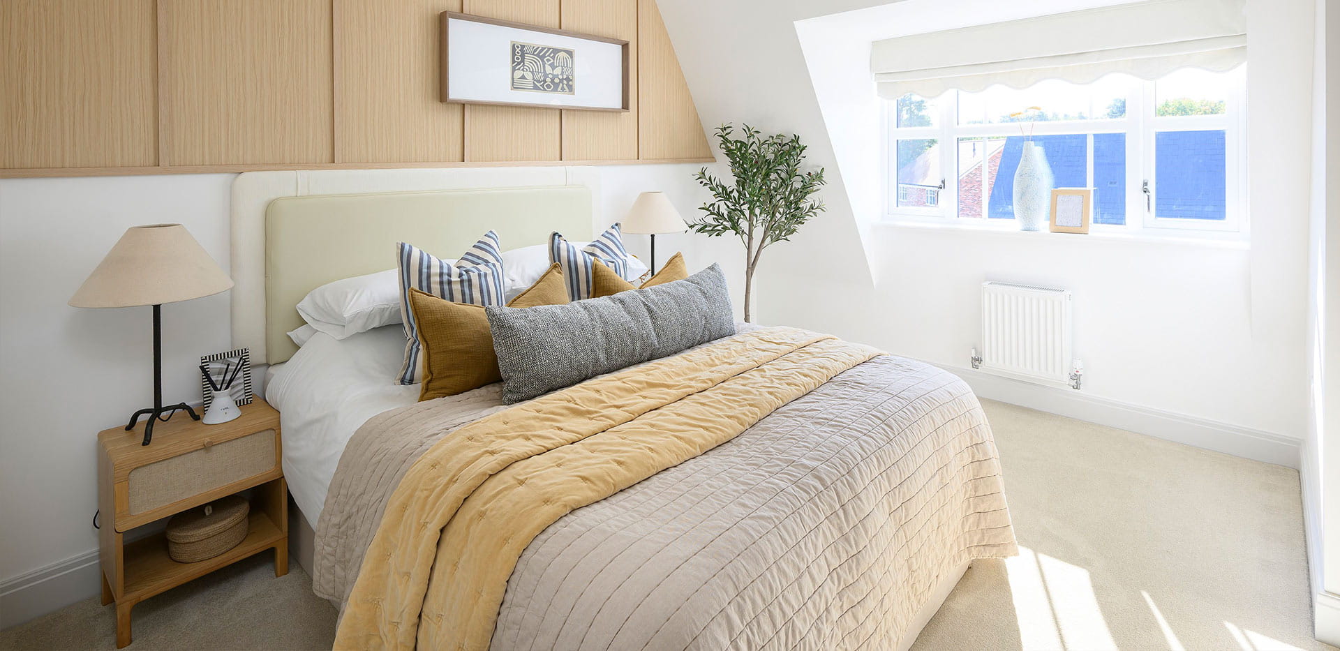 An interior Bedroom image at the 1 Bedroom Show Apartment at Hartland Village