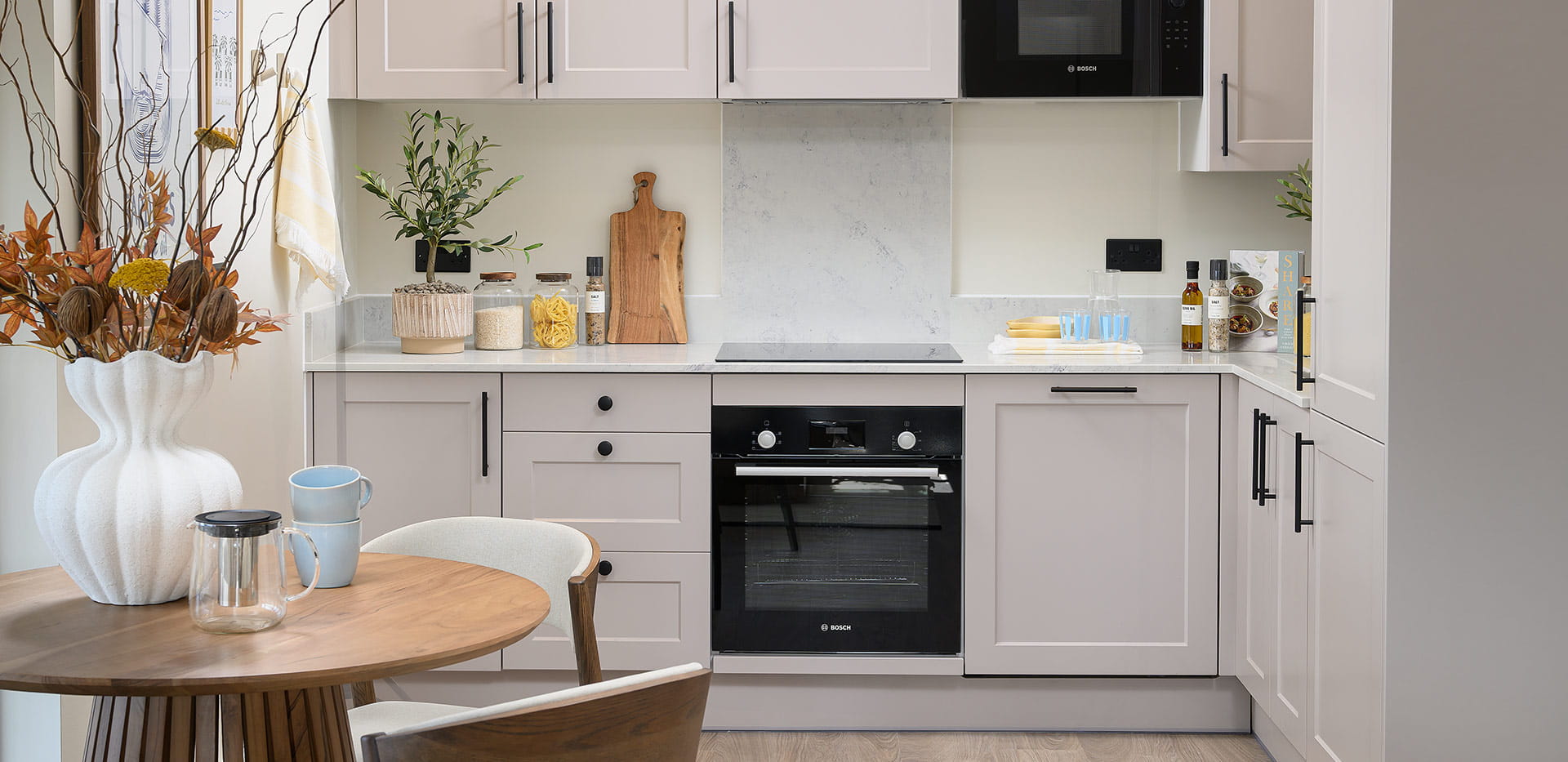 Hartland Village, Camellia Court apartments, well equipped kitchen with a light grey design