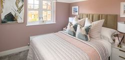 Hartland Village bedroom with pink decor