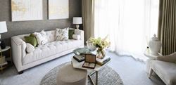 Hartland Village living area with white and sage decor