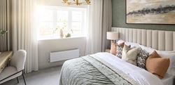 Hartland Village large bedroom with a subtle cream and green design