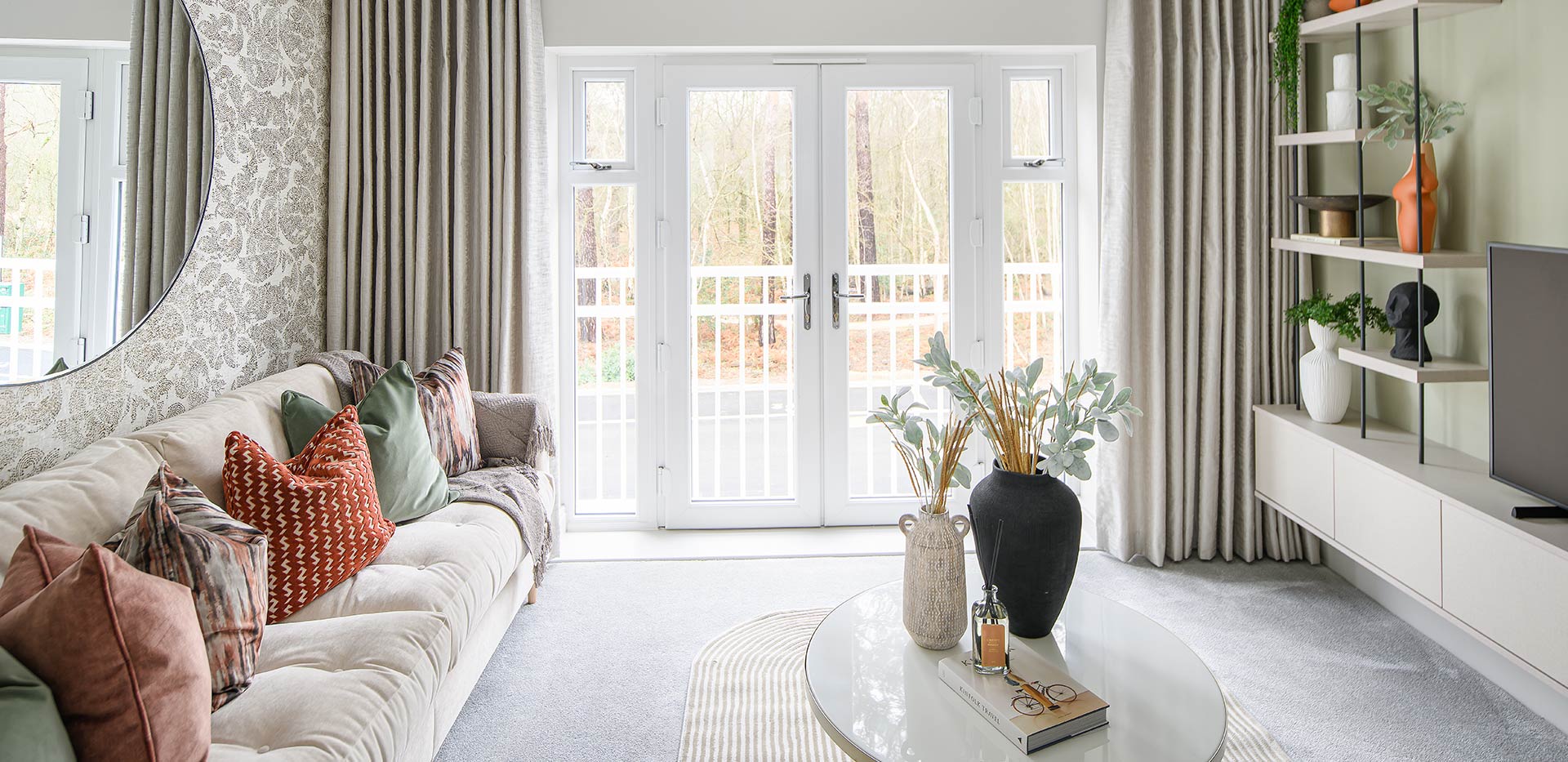 Hartland Village open living area with a neutral finish