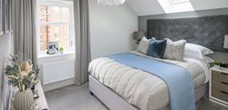 Double bedroom with baby blue and light grey decor