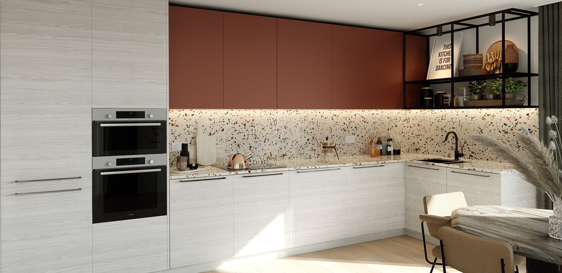 Heron Wharf kitchen with a light design with deep red elements